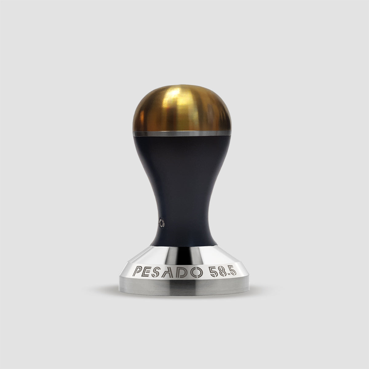 A Pesado 58.5 tamper with a black and gold color scheme, featuring a precision-machined 90 degree edge and a tamper diameter of 58.